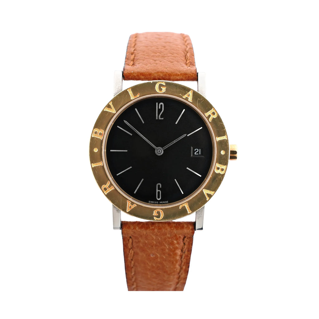 Front view of Bvlgari BB33 SG L 238436 quartz watch with a black dial, yellow gold bezel engraved with “BVLGARI,” stainless steel case, and brown leather strap.