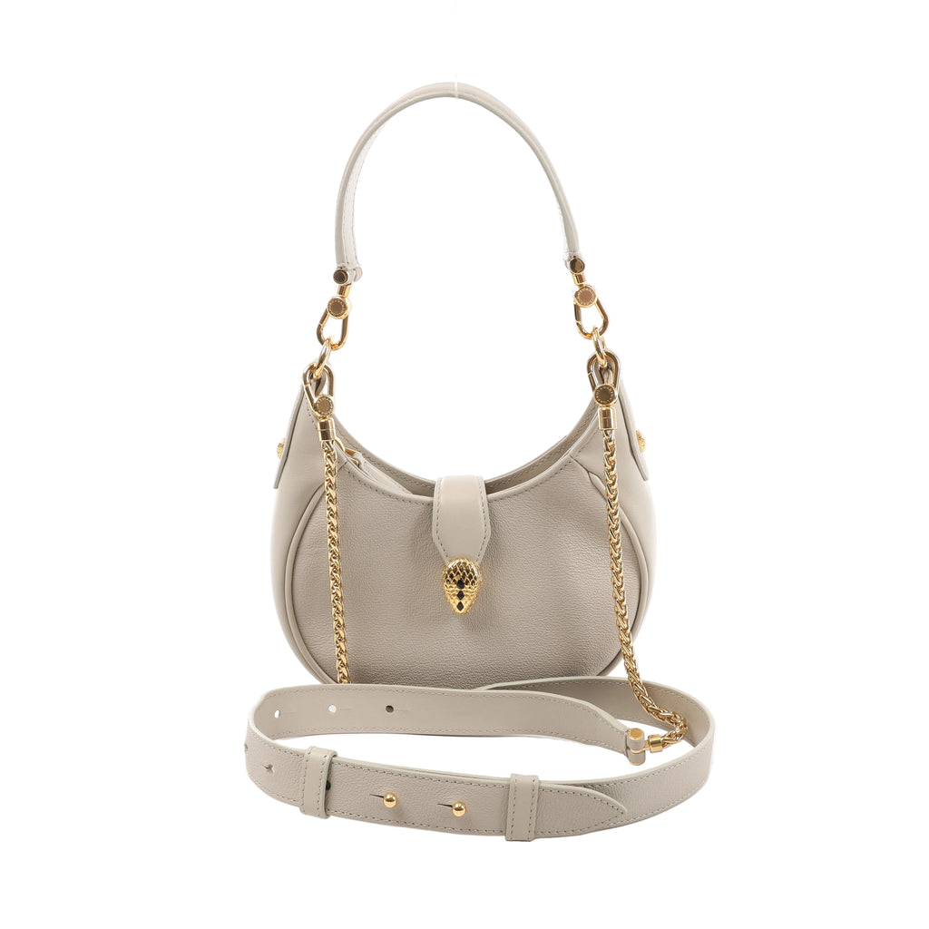 Gray Bvlgari Serpenti Ellipse leather shoulder bag with rounded silhouette, slim top strap and gold-tone snake-head front closure.