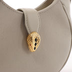 Bolso de hombro con cadena de charol BVLGARI Serpenti Forever en color naranja