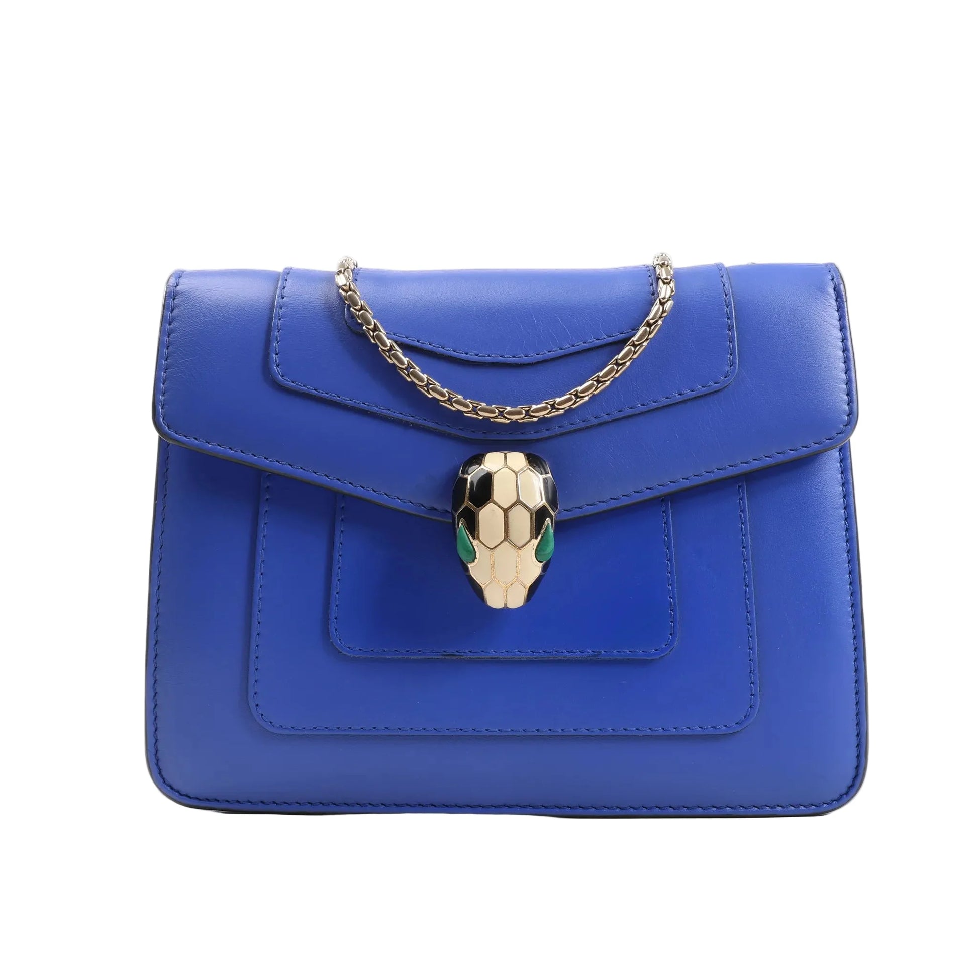 BVLGARI Serpenti Forever Chain Shoulder Bag in vibrant blue leather with a gold-tone chain strap and signature enamel snakehead clasp with black, white, and green detailing, displayed against a white background.