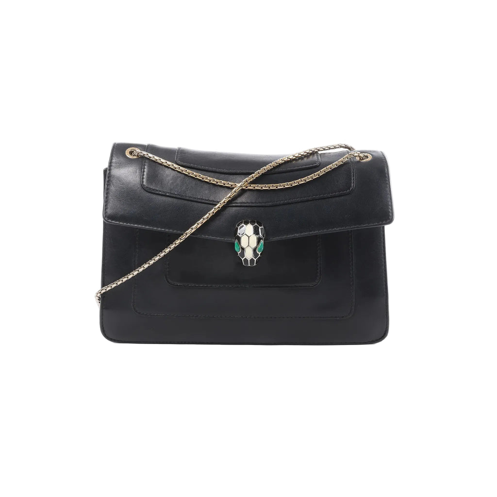 Black leather BVLGARI Serpenti flap bag with gold-tone chain strap and Serpenti head clasp on white background.