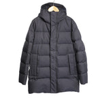 CC Collection Corneliani Down Quilted Puffer Coat in black featuring a hood, horizontal padded quilting, front zip closure with placket, and side pockets, displayed on a hanger against a light background.