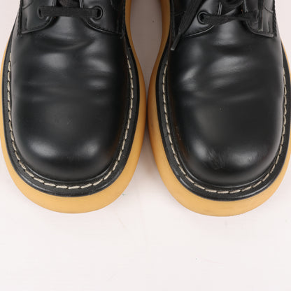 Bottega Veneta The Bounce - Bottines courtes en cuir noir et moutarde, pointure 39