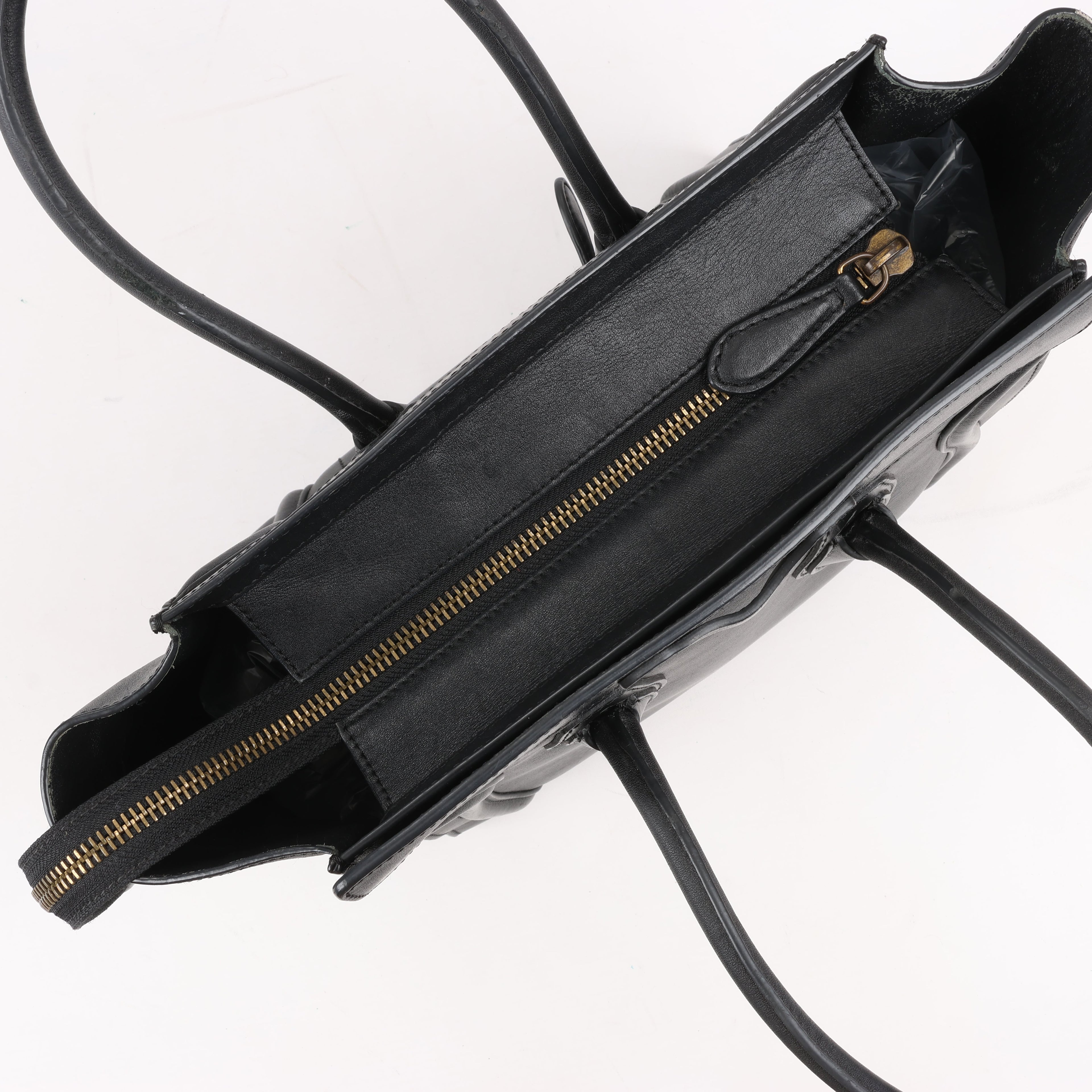 CELINE Luggage Micro Leather Handbag in Black