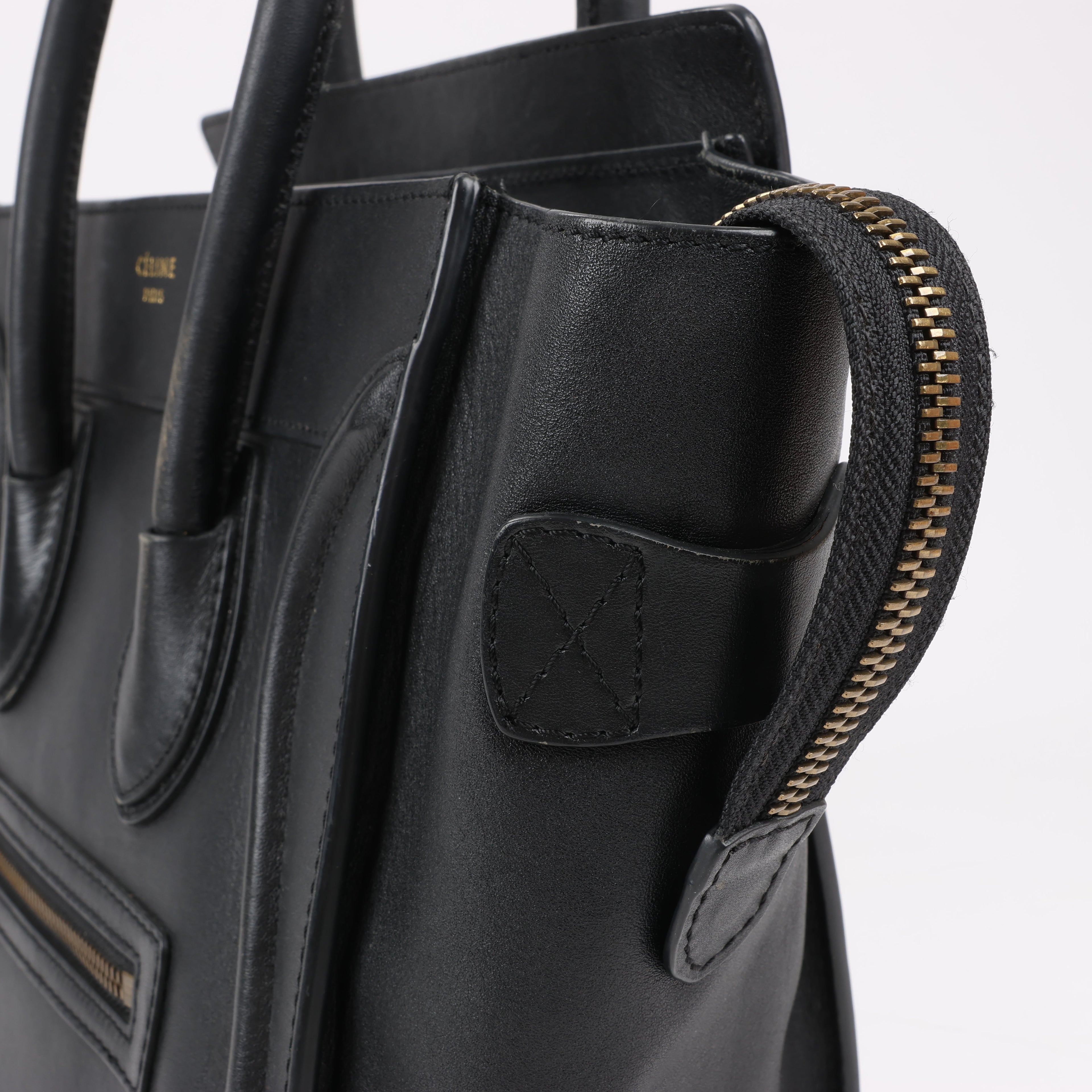 CELINE Luggage Micro Leather Handbag in Black