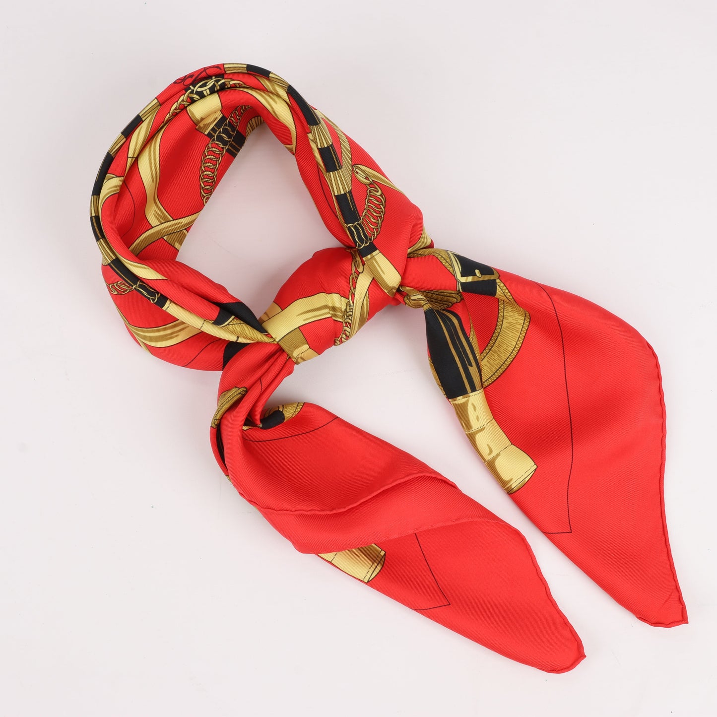 Hermès Carré 90 " Eperon d'or" Silk handkerchief in Red