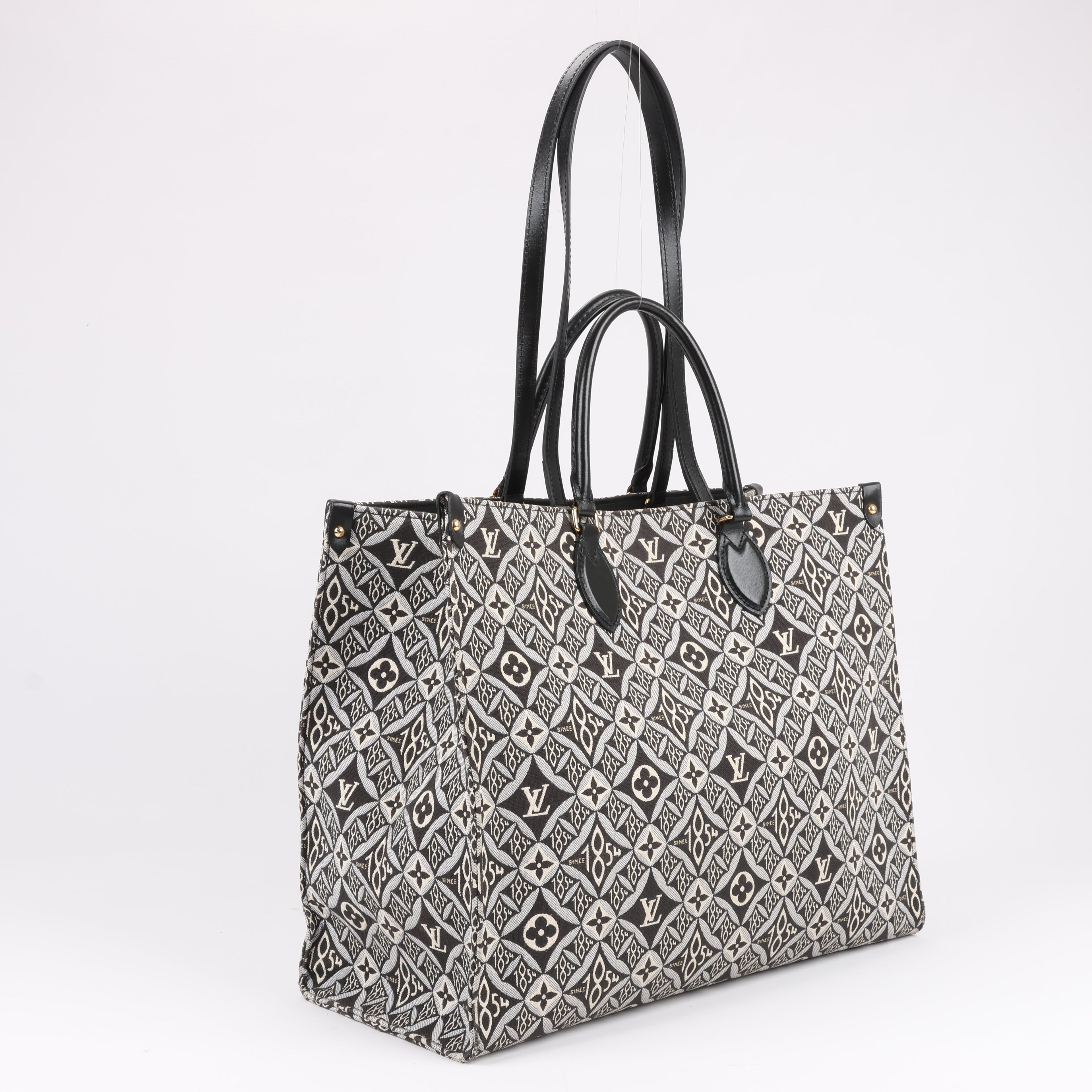 Bolso de mano Louis Vuitton Since 1854 OnTheGo GM en negro y blanco M57207