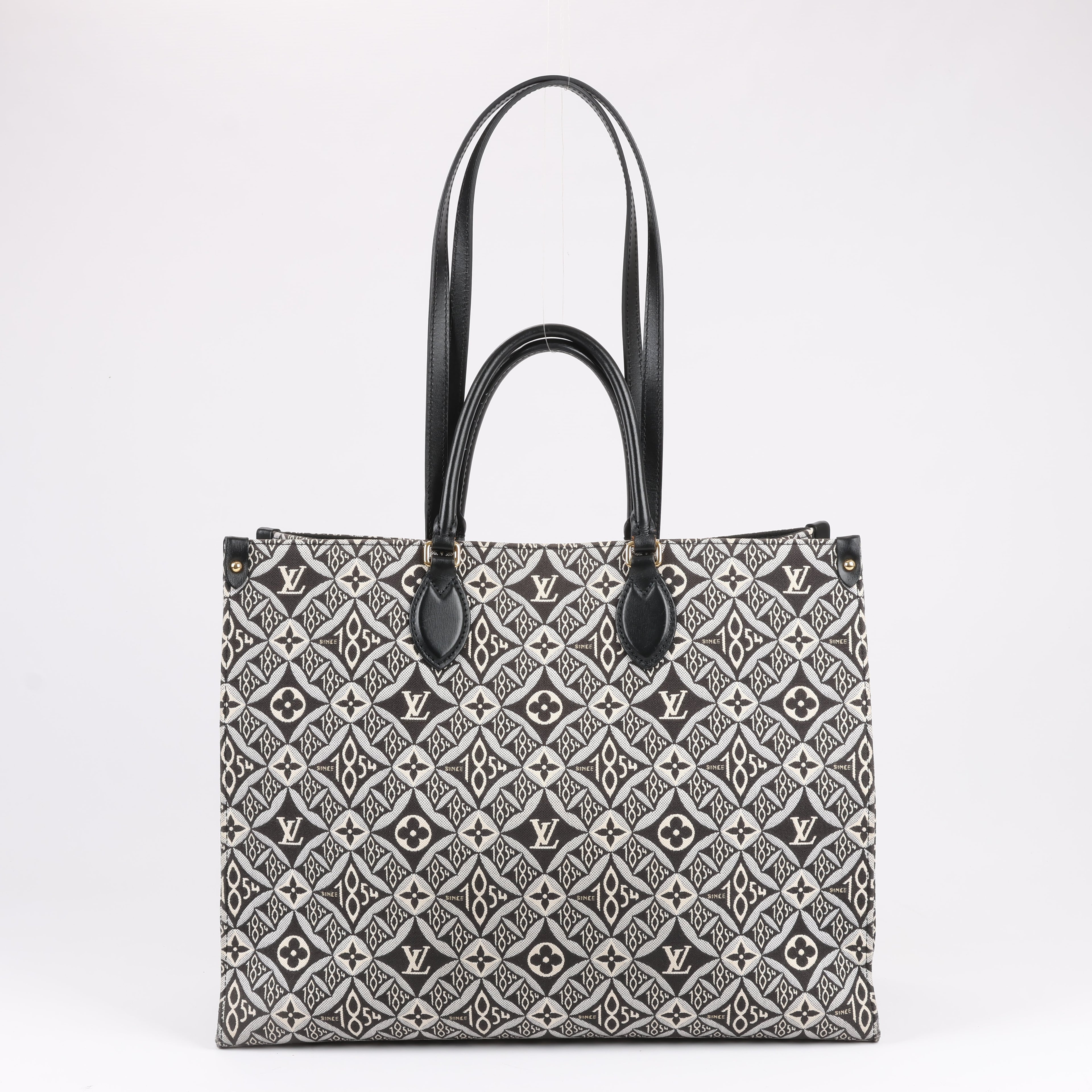 Bolso de mano Louis Vuitton Since 1854 OnTheGo GM en negro y blanco M57207