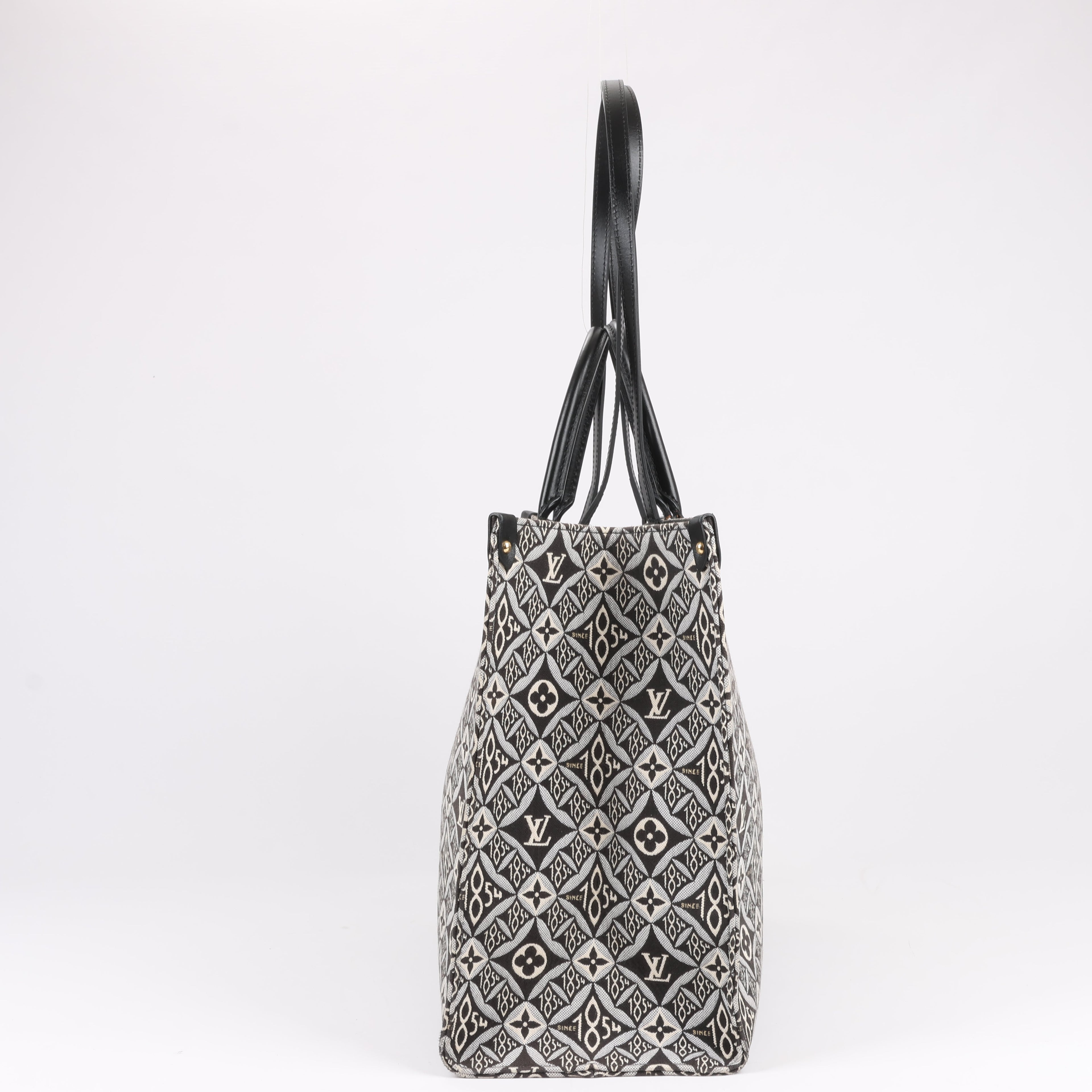 Bolso de mano Louis Vuitton Since 1854 OnTheGo GM en negro y blanco M57207