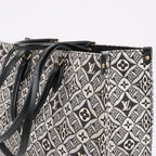 Bolso de mano Louis Vuitton Since 1854 OnTheGo GM en negro y blanco M57207