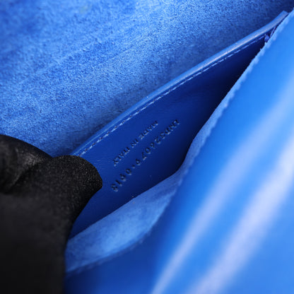 Saint Laurent Paris Pochette Kate Monogramme en cuir lisse bleu Majorelle