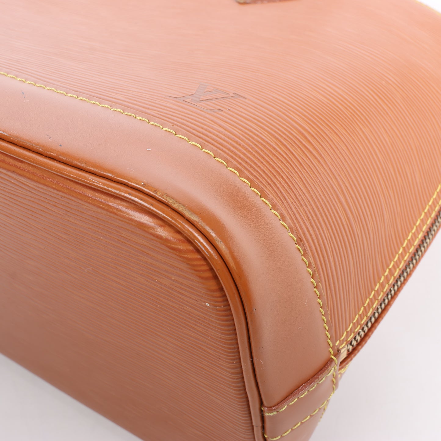 Louis Vuitton Epi Leather Alma Handbag in Brown