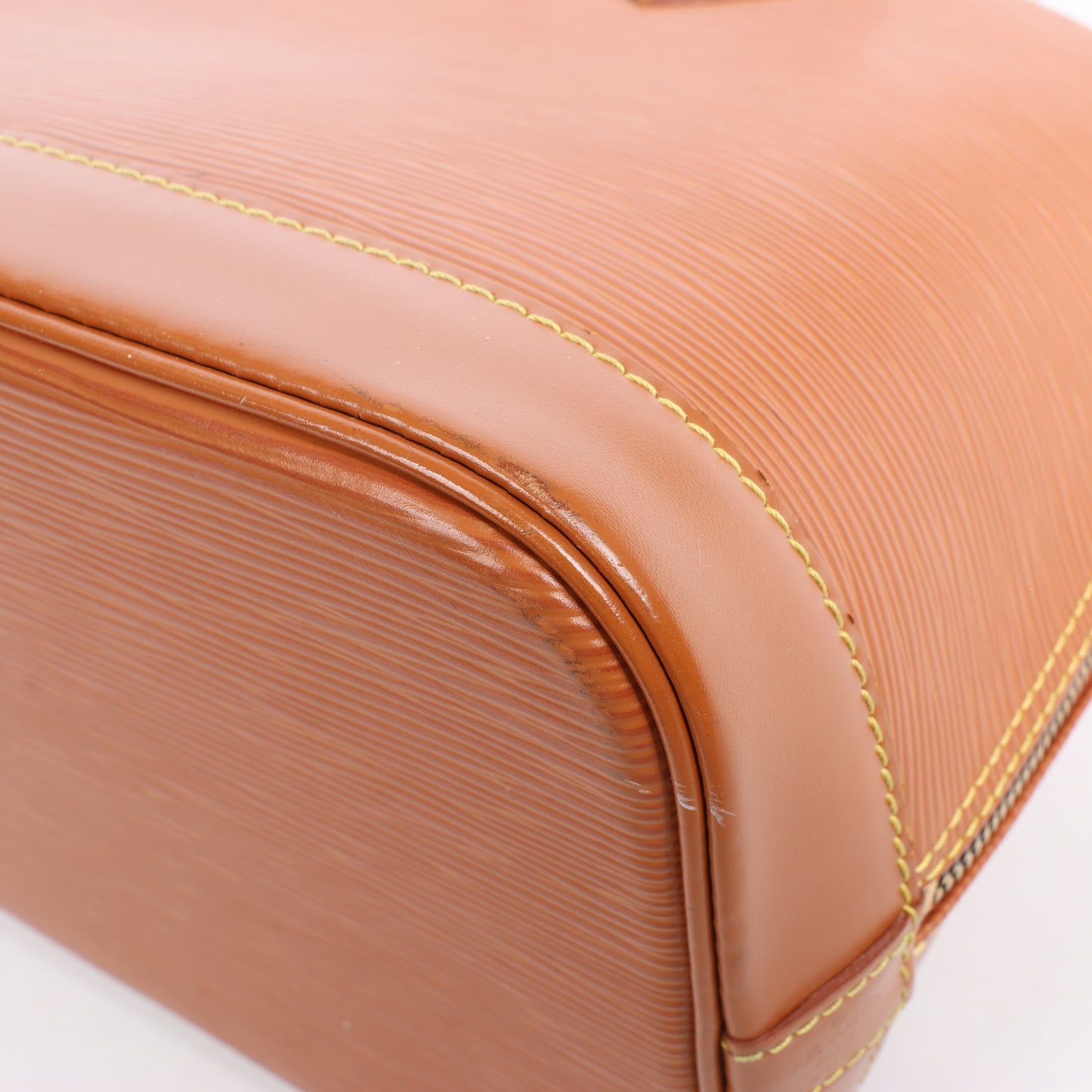Louis Vuitton Epi Leather Alma Handbag in Brown
