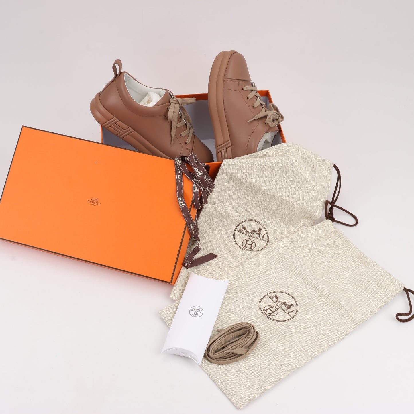 Hermès Happy Leather Sneakers in Brown, Size 39