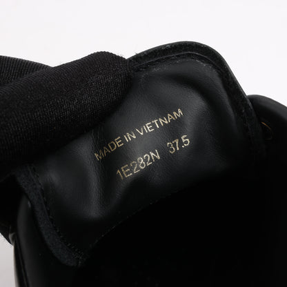 Baskets en cuir à logo PRADA, noir et blanc, 1E282N, pointure 37,5