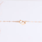 Non Signe / Unsigned Rose Gold (18k) chain and pendant set with 11 natural diamonds
