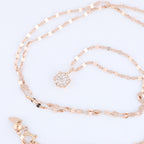 Non Signe / Unsigned Rose Gold (18k) chain and pendant set with 11 natural diamonds