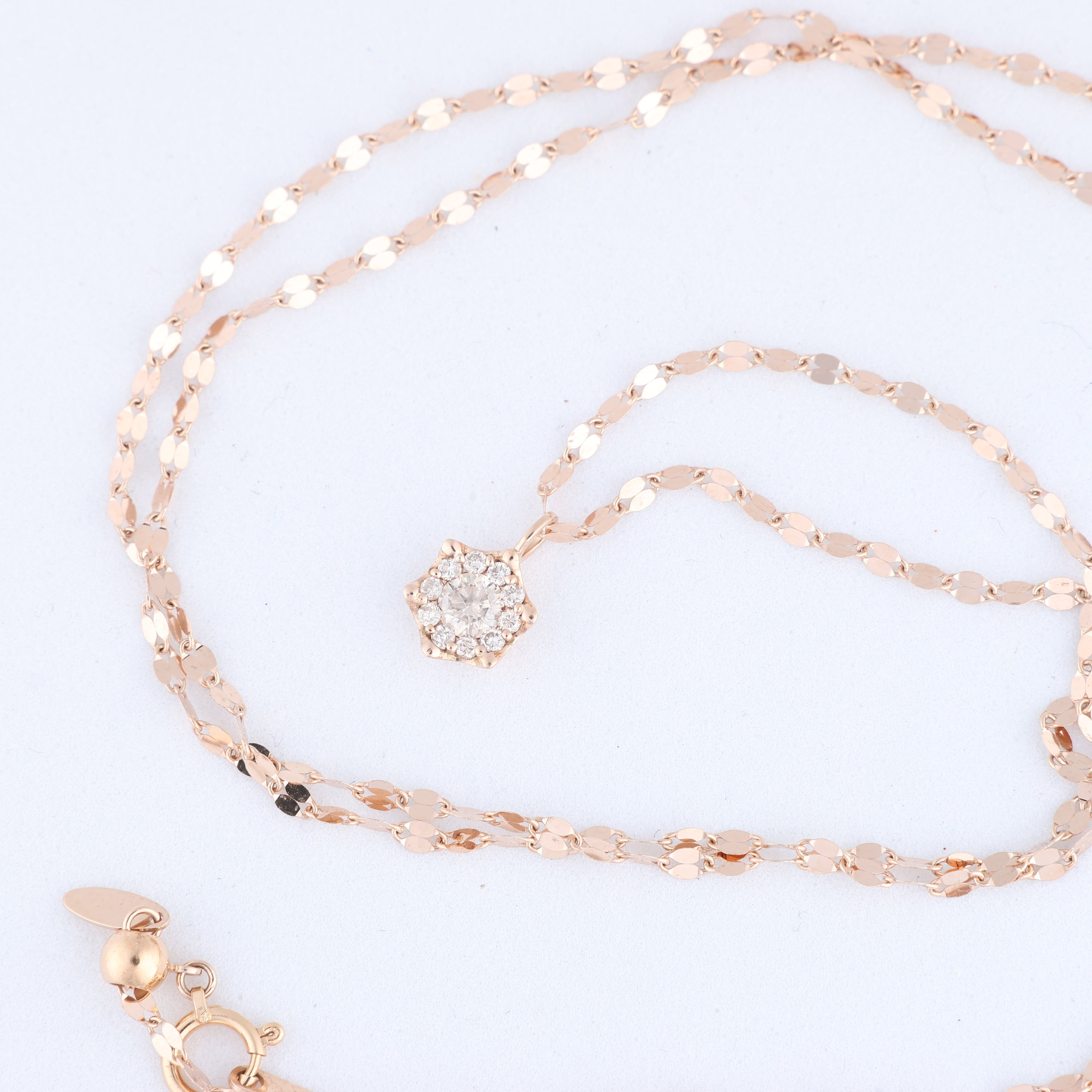 Non Signe / Unsigned Rose Gold (18k) chain and pendant set with 11 natural diamonds