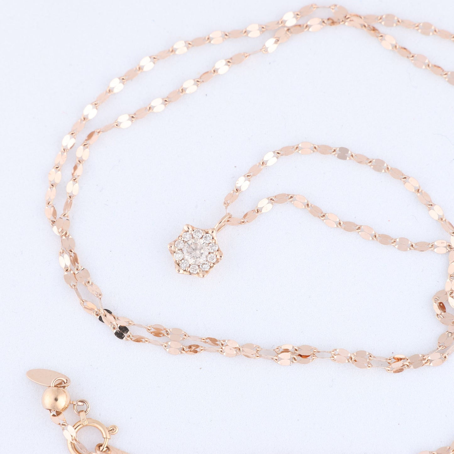 Non Signe / Unsigned Rose Gold (18k) chain and pendant set with 11 natural diamonds