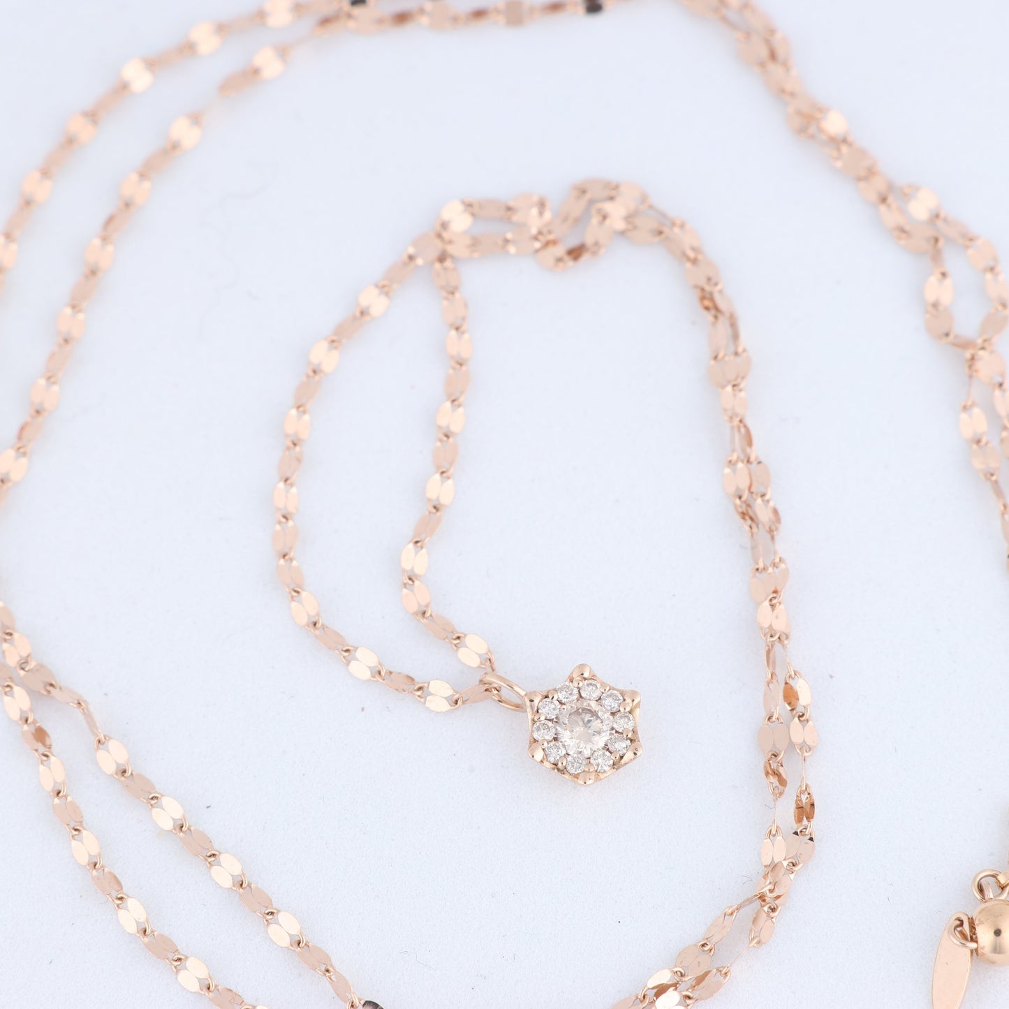 Non Signe / Unsigned Rose Gold (18k) chain and pendant set with 11 natural diamonds