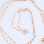 Non Signe / Unsigned Rose Gold (18k) chain and pendant set with 11 natural diamonds