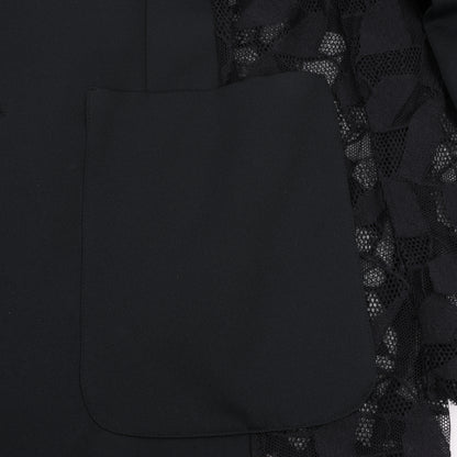 Blazer noir Maison Margiela avec superposition de dentelle, taille 40