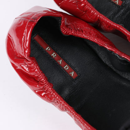 Ballerines Prada en cuir verni rouge avec nœud noir, taille 36,5 EU