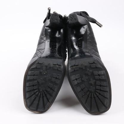 Bottes Dior en cuir noir Cannage Ice à revers en fourrure, pointure 40
