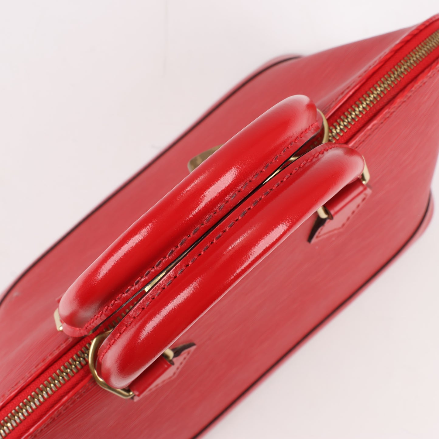Louis Vuitton Epi Leather Alma PM Handbag in Red