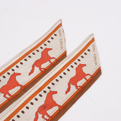 Hermès Sequences Horse Twilly Scarves in Orange
