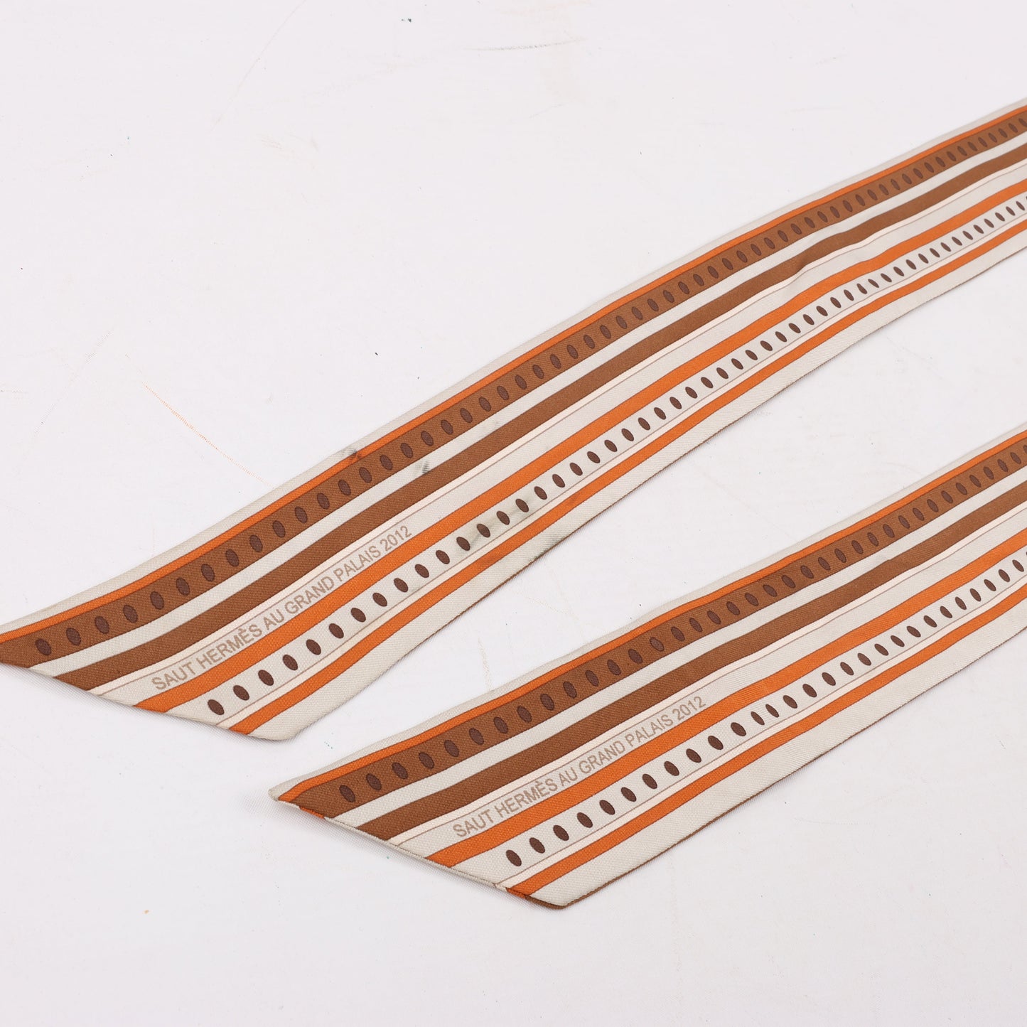 Hermès Sequences Horse Twilly Scarves in Orange