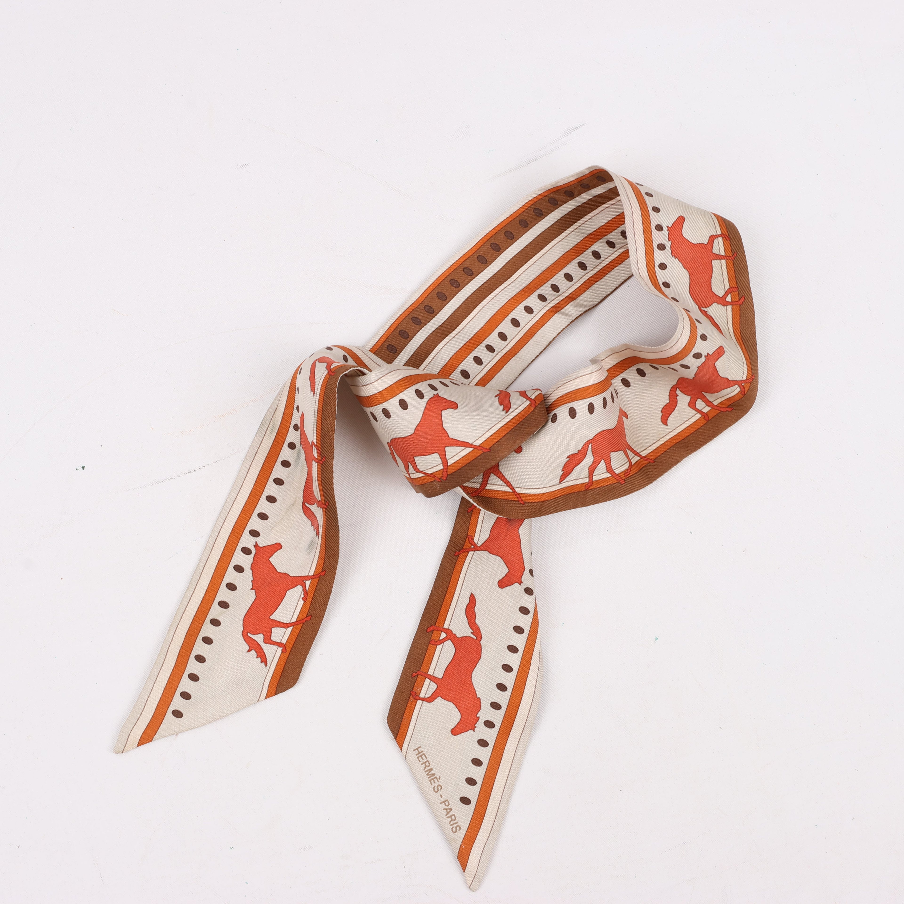 Hermès Sequences Horse Twilly Scarves in Orange