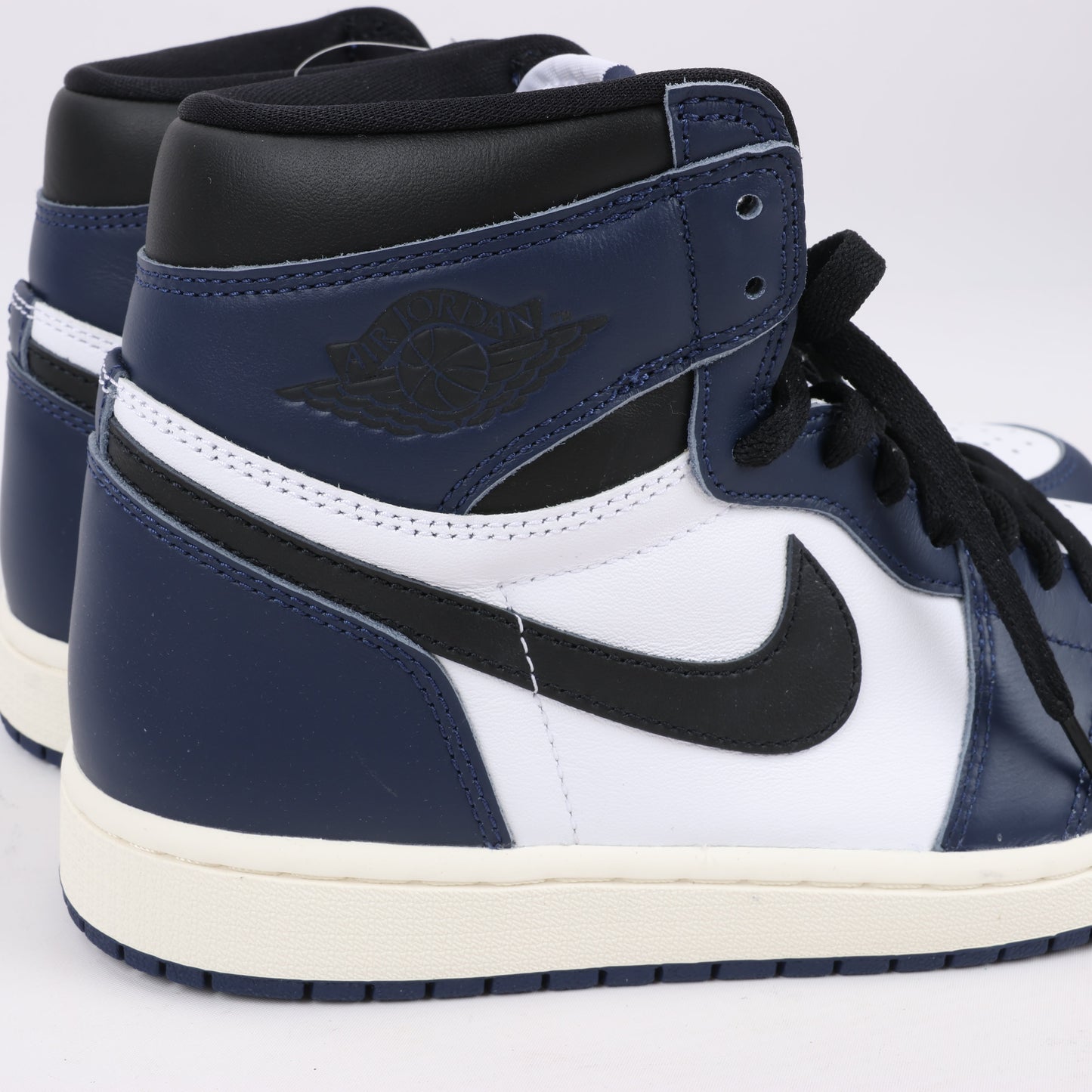 Nike Air Jordan Leather High-Top Sneakers in White x Navy DZ5485-401