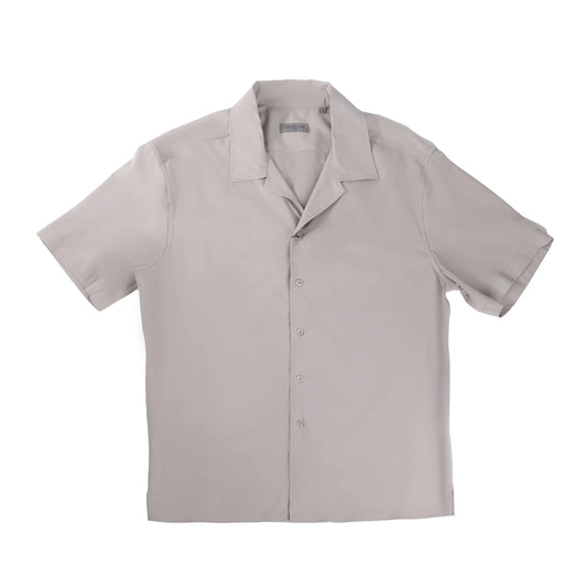CORNELIANI CIRCLE short-sleeve button-up shirt in solid gray with a relaxed collar and minimalist design, neatly laid flat against a white background, Size 41 IT.