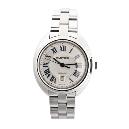 Cartier Clé de Cartier WSCL0005 automatic stainless steel watch with a silver guilloché dial, blue Roman numerals, date display at 6 o'clock, and polished link bracelet.
