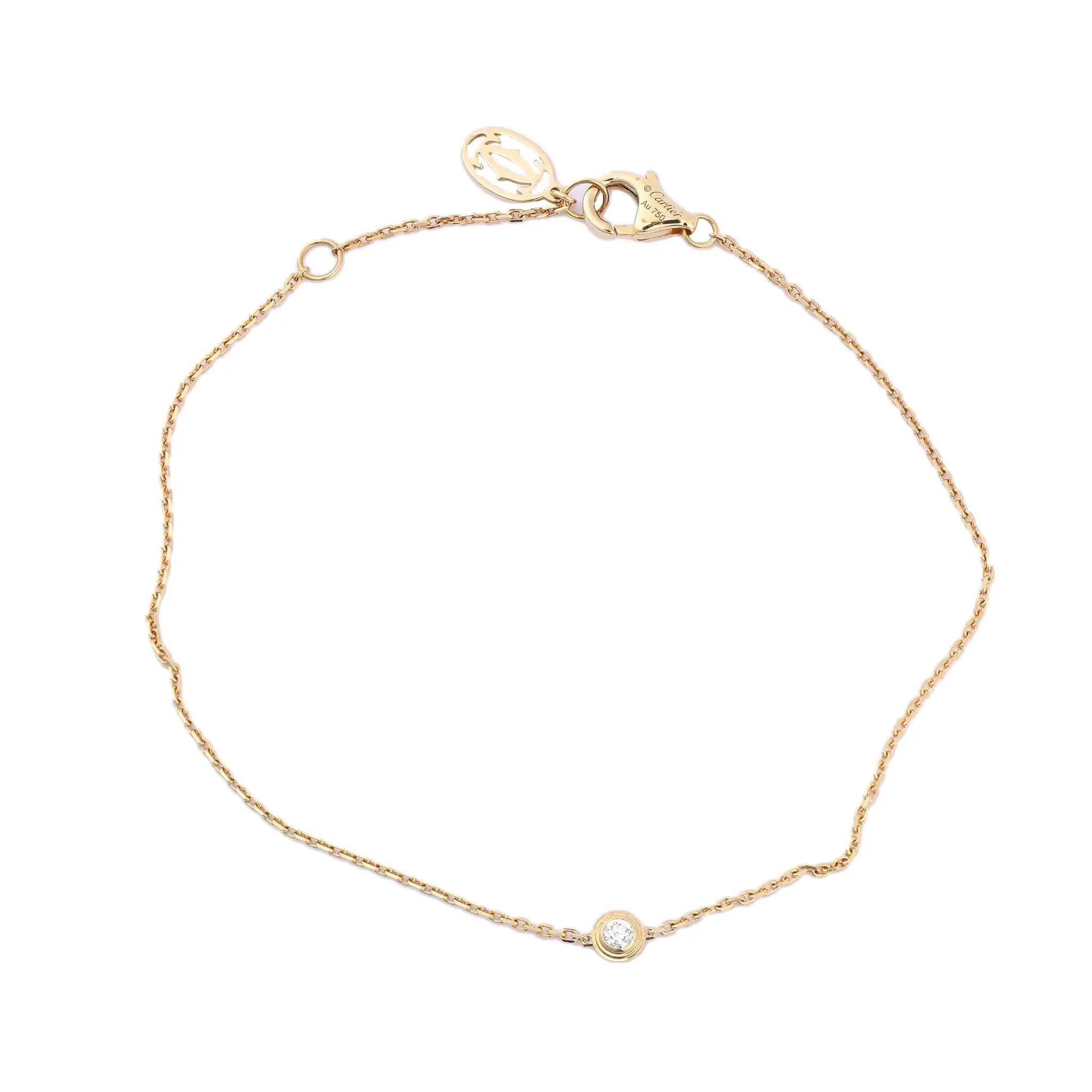 Cartier D'Amour XS bracelet in 18K yellow gold featuring a single bezel-set round diamond on a fine chain with lobster clasp and Cartier charm, model QQC093 CRB6045617, weight 1.4g.
