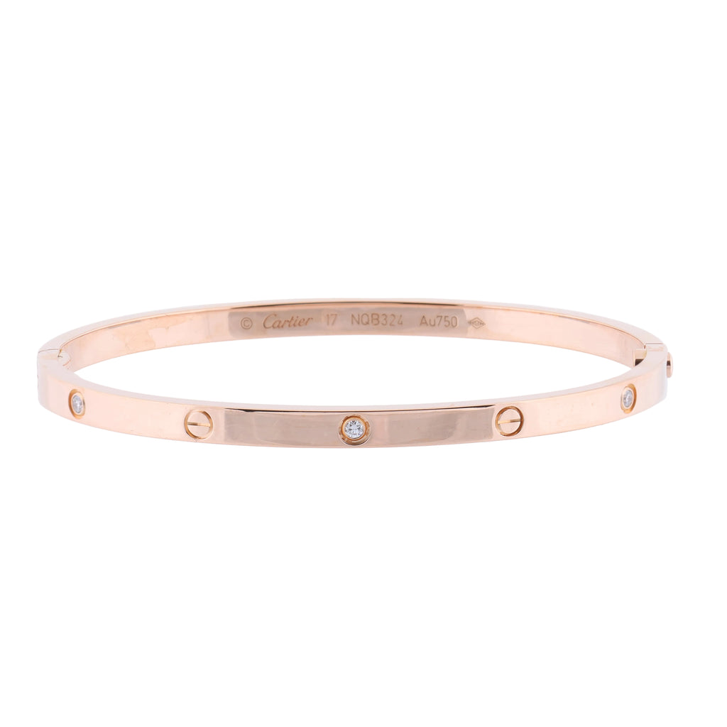Cartier Love SM rose gold bangle bracelet with screw motifs and small diamond accents on a white background