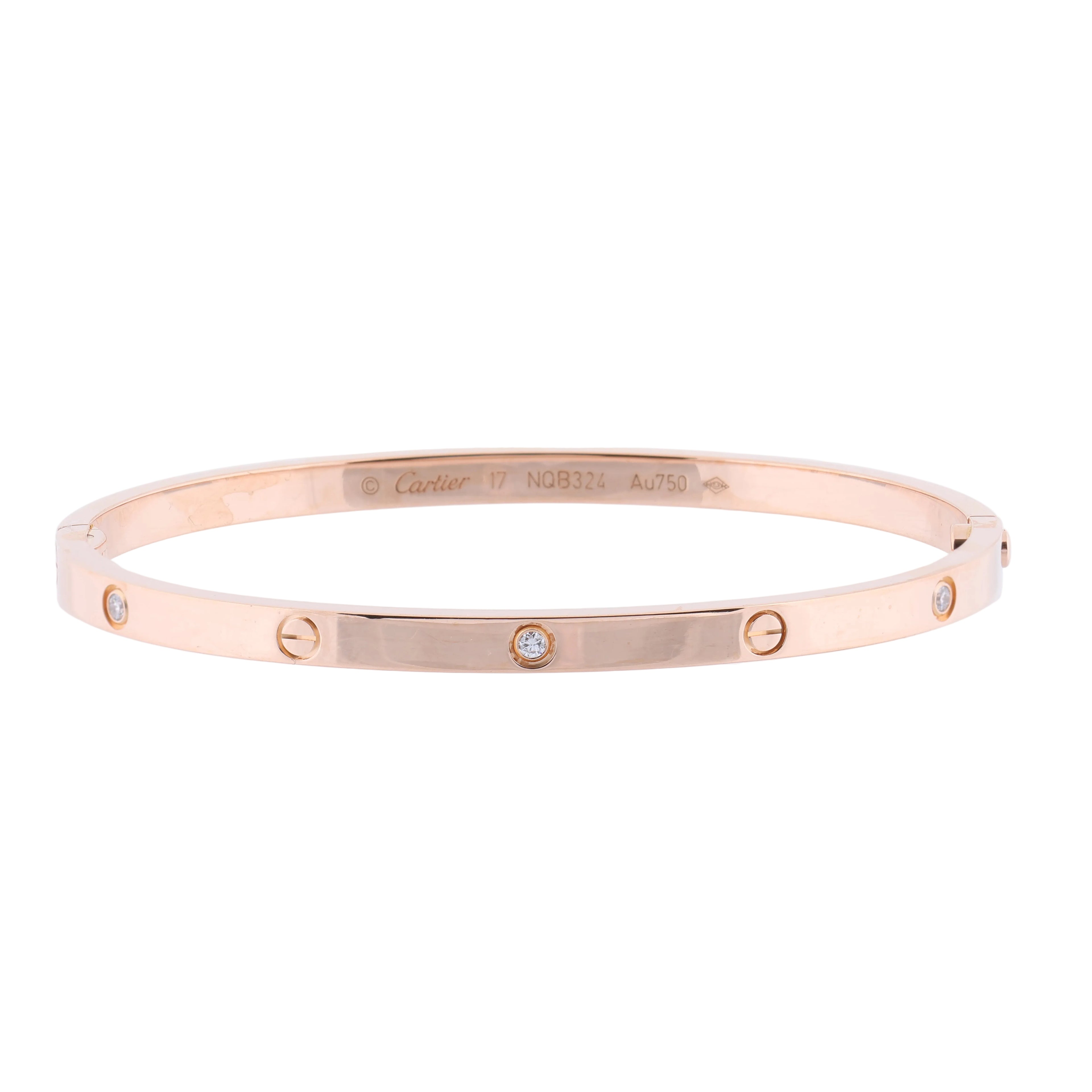 Cartier Love SM rose gold bangle bracelet with screw motifs and small diamond accents on a white background