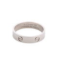 Cartier Love SM ring in 18K white gold with screw motifs and engraved Au 750 and size 69 markings on a white background.