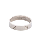 Cartier Love SM ring in 18K white gold with screw motifs and engraved Au 750 and size 69 markings on a white background.