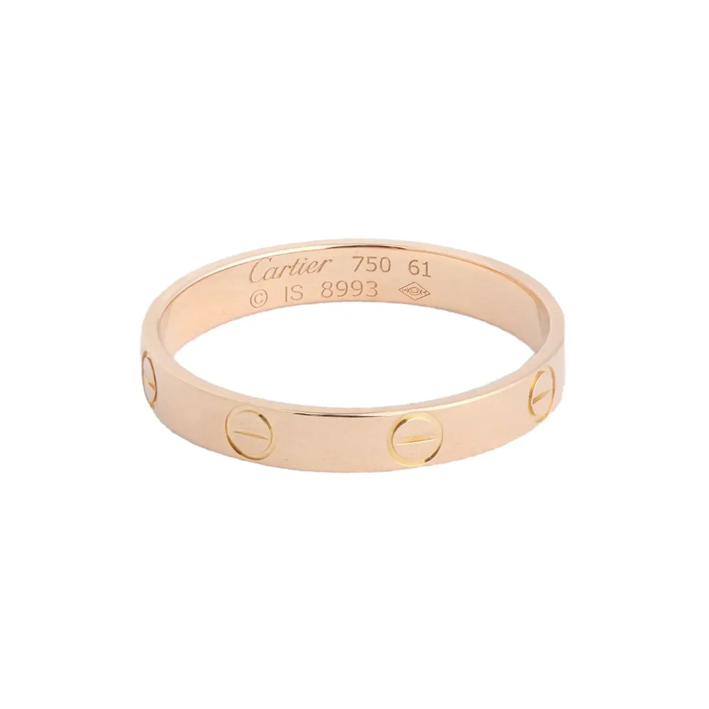 Cartier Mini Love yellow gold band ring with engraved screw motifs and “Cartier 750 61” interior hallmark