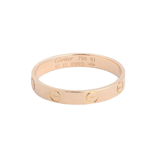 Cartier Mini Love yellow gold band ring with engraved screw motifs and “Cartier 750 61” interior hallmark