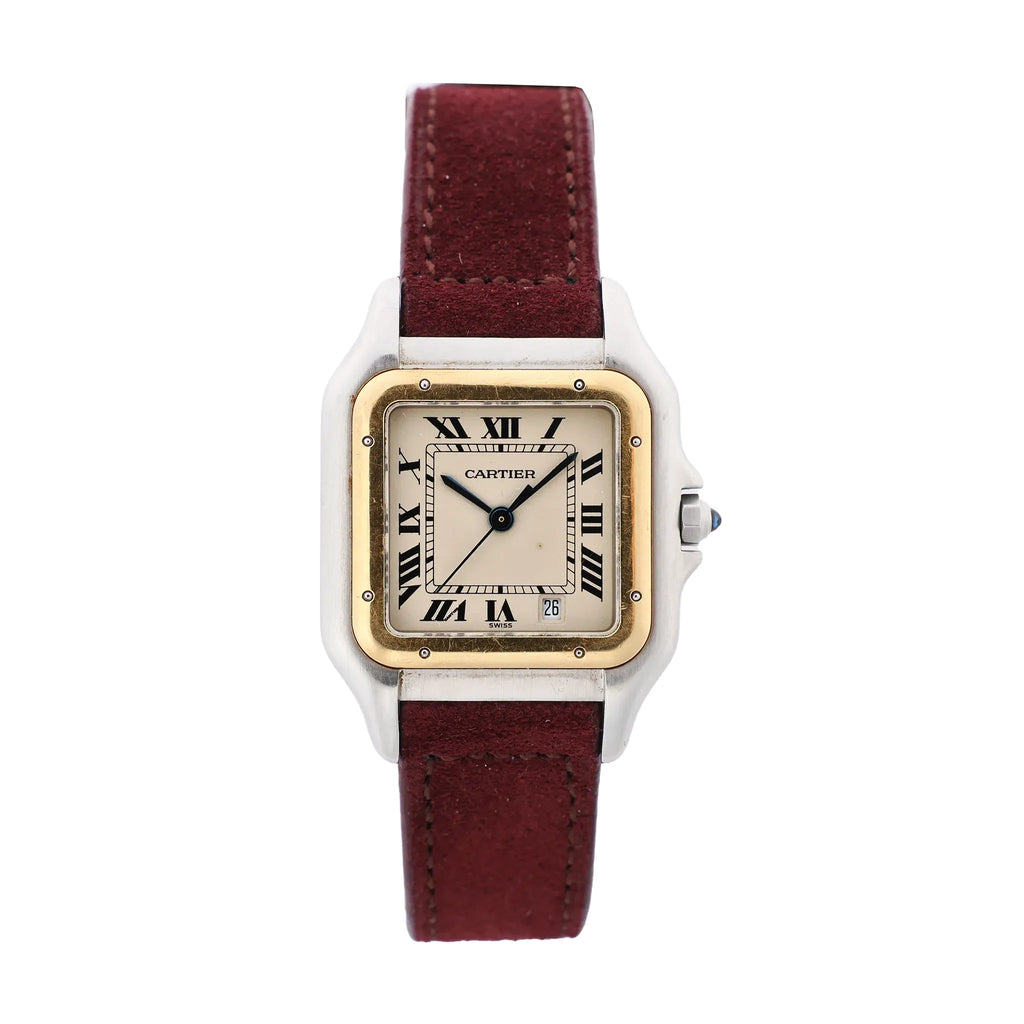 Close-up of Cartier Panthère watch with burgundy leather strap, two-tone steel and yellow-gold square case, ivory Roman numeral dial, blued hands, and date window at 6.
