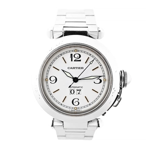 Close-up of a Cartier Pasha W31044M7 watch featuring a polished stainless steel case and bracelet, a white dial with bold black numerals, luminous sword-shaped hands, and a date display at 6 o’clock.