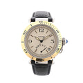 Cartier Pasha watch with a beige dial, gold-tone numbered bezel, power reserve indicator, date window and black leather strap.
