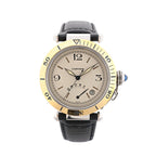 Cartier Pasha watch with a beige dial, gold-tone numbered bezel, power reserve indicator, date window and black leather strap.