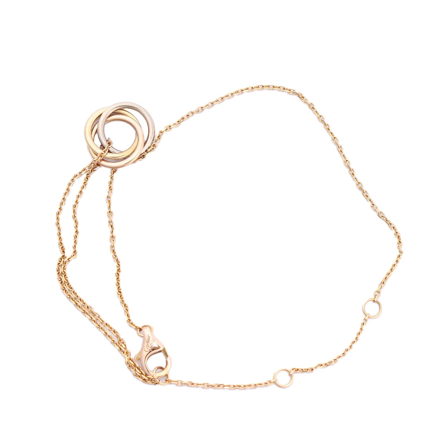 Cartier Sweet Trinity bracelet featuring interlocking 18K yellow, pink, and white gold rings on a fine yellow gold chain with adjustable loops and lobster clasp, model RV3751, weight 2.2g.