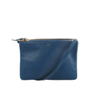 Celine Trio Small navy leather crossbody bag with gold-tone zip top, slim shoulder strap, and small logo stamp on front