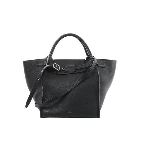 Celine Big Bag Small black grained leather handbag with top handle, belted front strap with silver buckle, winged sides, and detachable shoulder strap