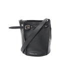 Minimalism with presence. The Céline Big Bag Bucket in black leather features a clean, sculptural shape with a belted detail and shoulder strap—an elevated everyday piece that feels quietly confident.